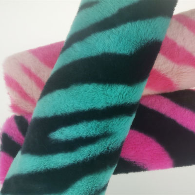Tricot de 15 mm de punto 100% poliéster muy suave con rayas de cebra impresa tela de piel de conejo falsa