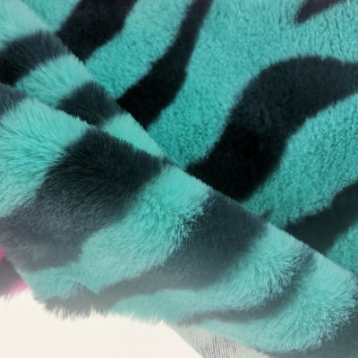 Tricot de 15 mm de punto 100% poliéster muy suave con rayas de cebra impresa tela de piel de conejo falsa