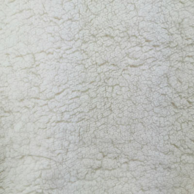 Técnicas de no tejido con punto 100% poliéster de punto de color blanco suave y cálido de sherpa