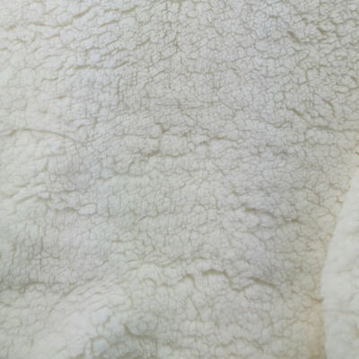 Técnicas de no tejido con punto 100% poliéster de punto de color blanco suave y cálido de sherpa