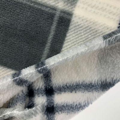 Tejido de ropa de peluche 100% poliéster tejido de franela de punto para manta