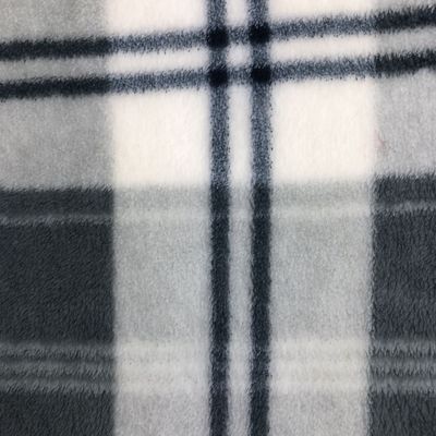 Tejido de ropa de peluche 100% poliéster tejido de franela de punto para manta
