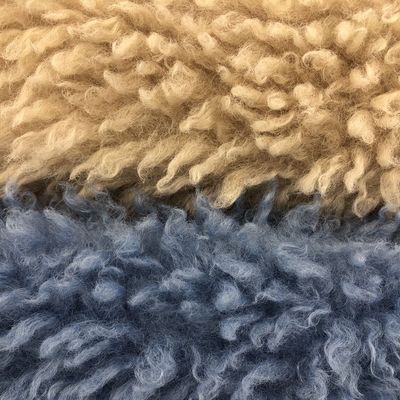 Material delantero 100% poliéster tela de piel falsa de pila larga para prendas acogedoras y con estilo