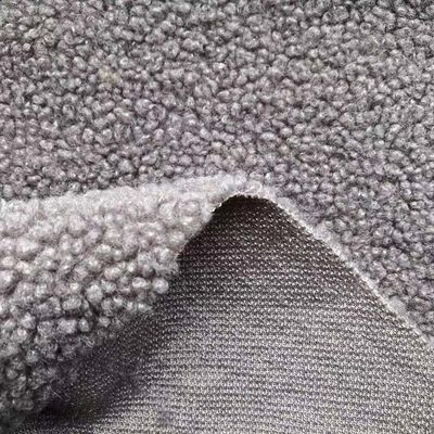 Tejido 100% de poliéster blanco falso de lana de peluche Sherpa real para accesorios de invierno