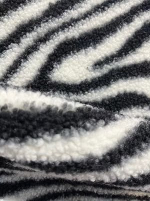 Tejido de peluche impreso a medida Caliente 100% poliéster Tricotado para abrigo y juguete Ancho 58/60