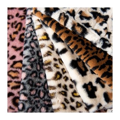 Tejido 100% poliéster súper suave Impresión de leopardo de piel de conejo de piel falsa Tejido grueso