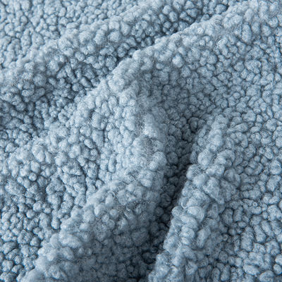 Tejido suave y acogedor 100% poliéster de color sólido de lana de sherpa para chaquetas de moda