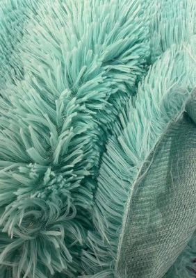 Tejido de juguete de peluche con material de fondo 100% poliéster y textura duradera