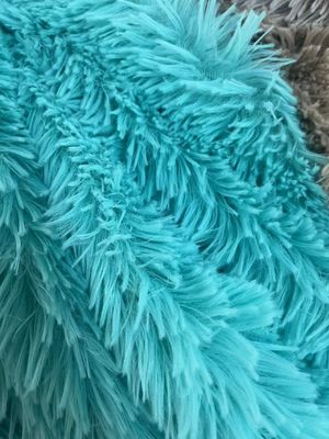 Tejido de juguete de peluche con material de fondo 100% poliéster y textura duradera