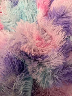 Tejido de juguete de peluche de poliéster de punto 100% de piel falsa de pila larga para animales de peluche