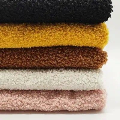 Tejido de lana de peluche de punto con patrón impreso para capas de pelo Muestra gratuita ofrecida