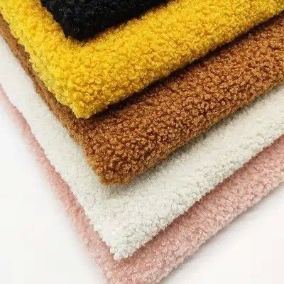 Tejido de lana de peluche de punto con patrón impreso para capas de pelo Muestra gratuita ofrecida