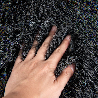 Material de espalda 100% arcílico Jacquard artificial de piel larga Tejido de piel falsa para prendas de vestir