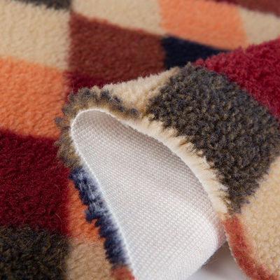 Tejido de peluche de poliéster 100% Jacquard Tejido Sherpa Perfecto para lanzar mantas