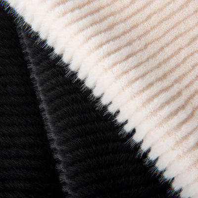 Suave y acogedor 100% de poliéster Tricot de punto de piel falsa cepillado tela para el abrigo de las damas