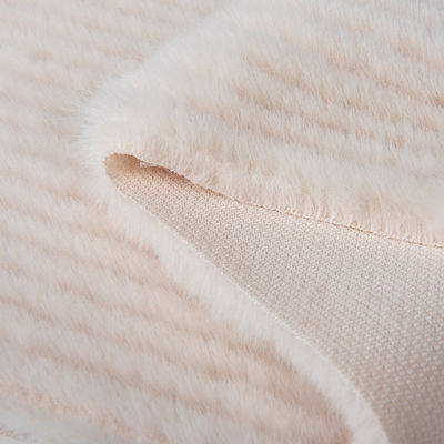 Suave y acogedor 100% de poliéster Tricot de punto de piel falsa cepillado tela para el abrigo de las damas